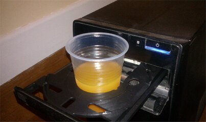 Cd_reader_used_as_a_cup_holder.jpg